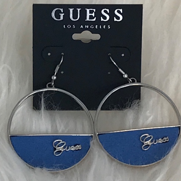 NWT Guess Silver Tone Hoop Earrings With Silver Cursive Logo On Blue Background - Picture 4 of 11